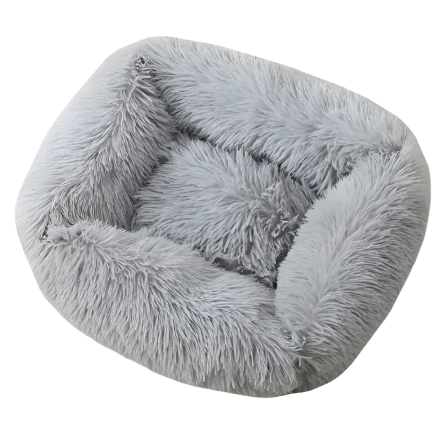 Luxury pet bed designed for dogs and cats, featuring soft plush fabric and a durable base for ultimate comfort and long-lasting use